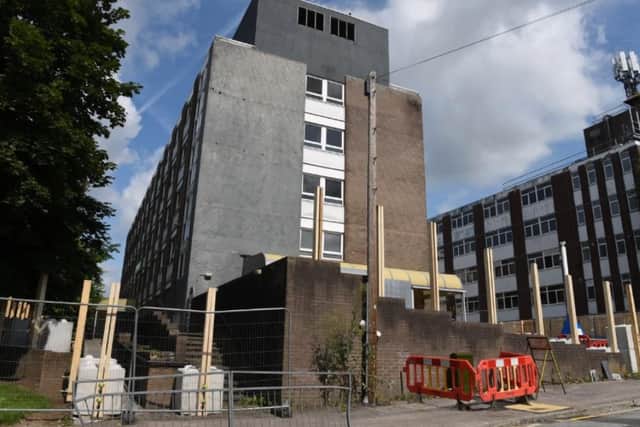 Work has begun to dismantle the old Barry House office block.