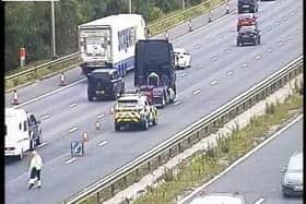 The lorry cab broke down in the third lane at around 11.30am, between junctions 21A (Croft Interchange, M62) and 21 (Woolston, Warrington), prompting police and Highways patrols to rush to the scene to help the driver. Pic: Highways