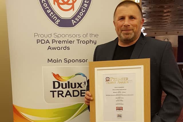 Andrew O'Neill with a previous award