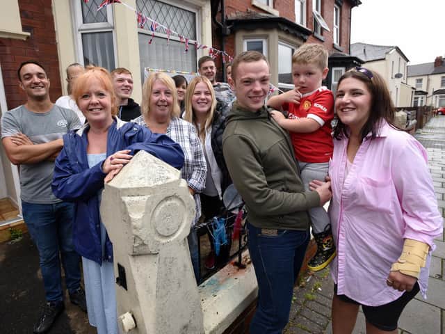 Jess Cook, right, with partner Jayson and son Oscar, was given a surprise homecoming welcome by pals. Picture: Paul Heyes Photography