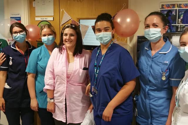 Jess Cook (centre) is giving a send-off by staff from Royal Preston Hospital's neurological rehabilitation unit.