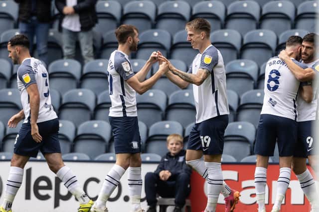 Emil Riis is congratulated after opening the scoring for PNE against Hull City