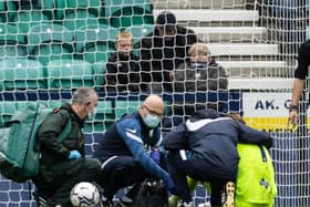Preston North End goalkeeper Declan Rudd is attended to after being concussed during the game against Hull City