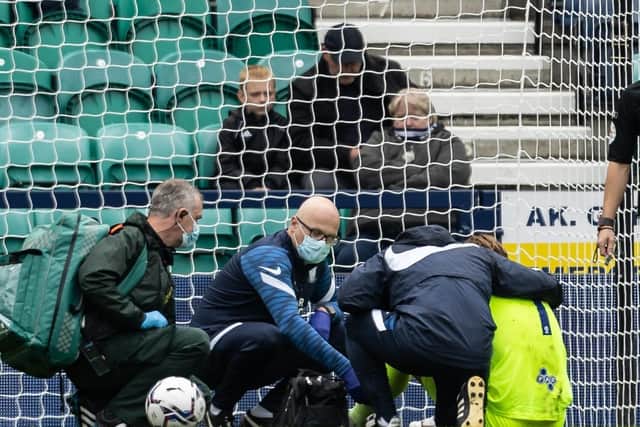 Preston North End goalkeeper Declan Rudd is attended to after being concussed during the game against Hull City