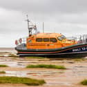 The Lytham St Annes relief all-weather lifeboat on the beach following the rescue and tractor winch failure