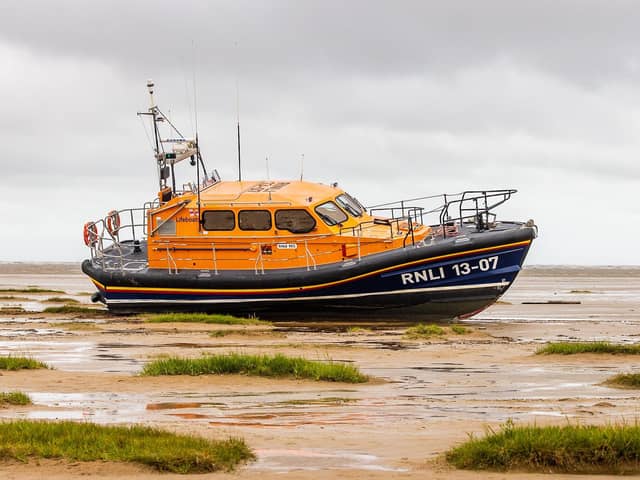 The Lytham St Annes relief all-weather lifeboat on the beach following the rescue and tractor winch failure