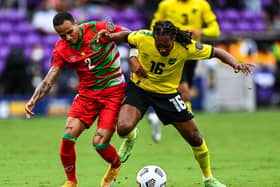 Taking on Suriname’s Damil Dankerlui at the Gold Cup with Jamaica (photo: Getty Images)