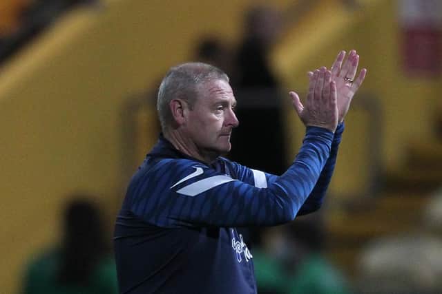 Preston North End head coach Frankie McAvoy applauds the PNE fans after the win at Mansfield Town