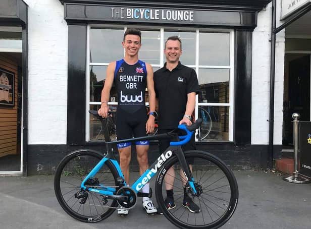 Matt Middleton, owner of The Bicycle Lounge, with triathlete Ethan Bennett, whom they sponsor