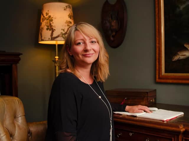 Lisa Nicholas at her desk (credit David J Atkinson)