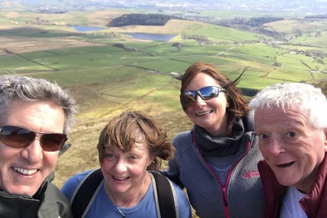 Lisa with husband Steve and parents Susan and Roger Jeary up Pendle Hill