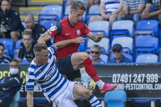 Preston North End striker Emil Riis rides a tackle in the defeat to Reading