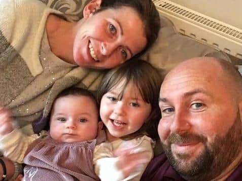 Dave with his wife Rebecca and their two daughters. The family now live in the Midlands. Pic: Dave Watson