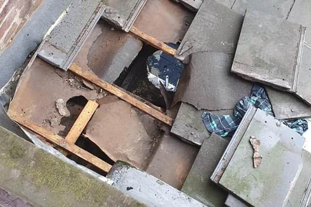 A thief armed with a knife removed roof tiles before smashing his way through the roof of the Shahi Tandoori takeaway in Ribbleton Lane, Preston on Sunday morning (August 15). Pic: Shahi Tandoori