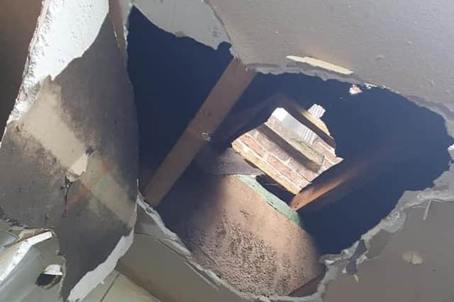The thief crashed through the kitchen ceiling before stealing two charity boxes and money from the till. Pic: Shahi Tandoori