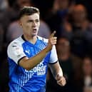 Peterborough United’s Harrison Burrows celebrates scoring the opening goal in Tuesday’s 2-2 draw with Cardiff