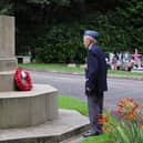 WW2 veteran Stuart Taylor, 96, lays a wreath at the war memorial in Preston Cemetery.