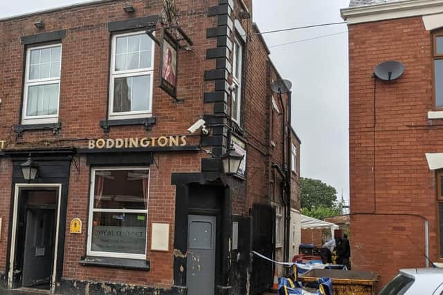 It is believed a drainage specialist fell into the hole while making repairs next to the Royal Consort pub.