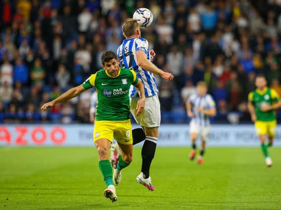 Ched Evans battles for the ball.