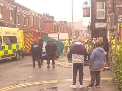 Emergency services were called to help a man who had become stuck after "falling down a hole" in Preston. (Credit: Idris Selant)