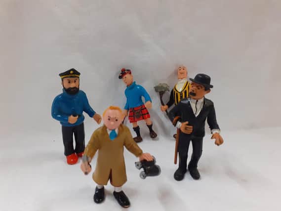 These figurines are from a collection currently in the centre, averaging around six pounds for the more common ones. The rarer Tintin in a brown coat holding a gun and binoculars is nine pounds