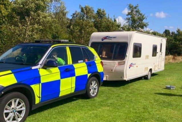 Officers seize caravans. Picture courtesy of Lancashire Police.