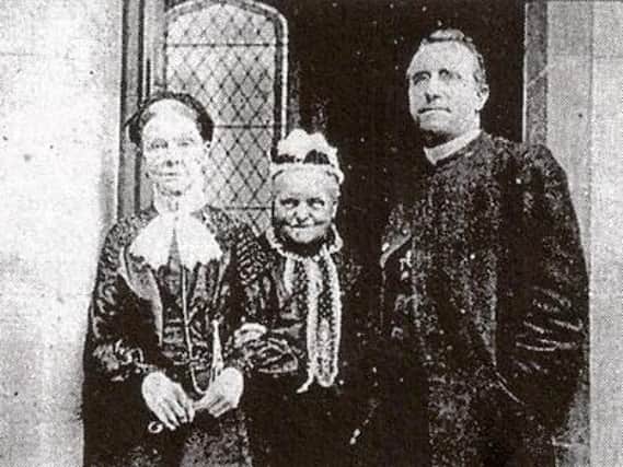 Margaret Coulston, centre, Mrs Smith and Fr Thomas Murphy pictured at St Joseph's Church.