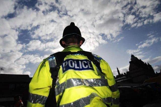 Eyewitnesses said up to 15 police vehicles were sent to the scene in Heys Road, Blackburn.