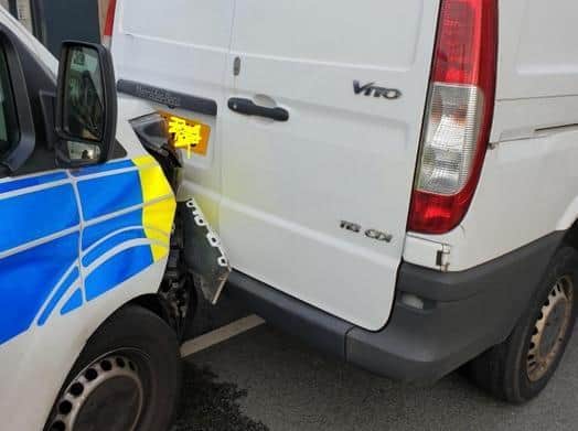 Three men have been arrested after a stolen van containing weapons reversed and smashed into a police car in Burnley on Monday evening (August 23)