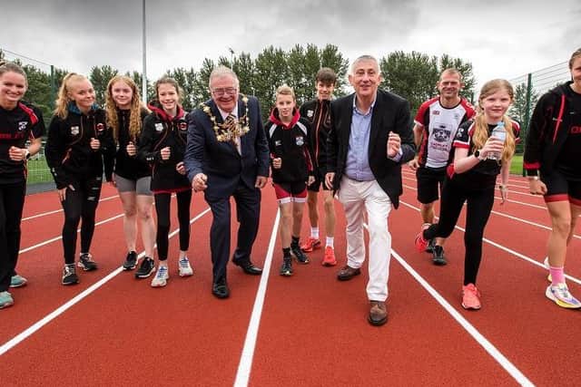 Sir Lindsay Hoyle MP and Mayor of Chorley, Councillor Steve Holgate, with Chorley Athletics & Triathlon Club