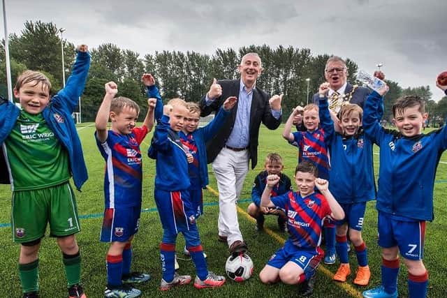 Sir Lindsay Hoyle MP and Mayor of Chorley, Councillor Steve Holgate, with players from Brinscall Village Juniors FC