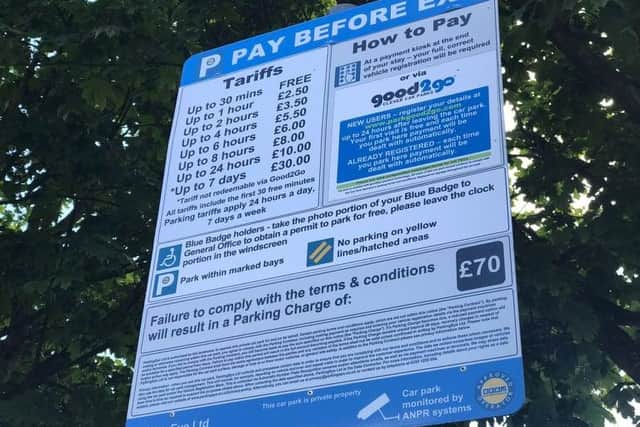The payment exemption for blue badge-holders is detailed on these signs in the all-purpose car parks at at Preston and Chorley hospitals...