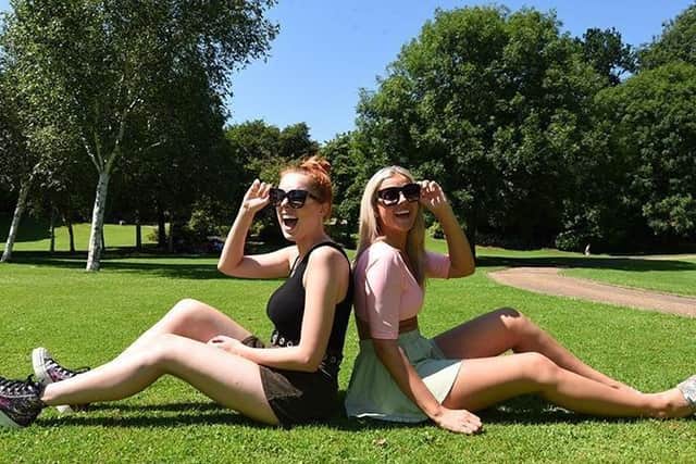 Melissa Littlechild and Ebony Gilmour have fun in the sun at Avenham Park during the July heatwave