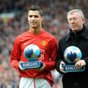 Manchester United's Alex Ferguson and Cristiano Ronaldo receive their manager and player of the month trophies in 2008