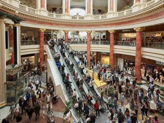 The Trafford Centre was busy with shoppers when armed police swooped.