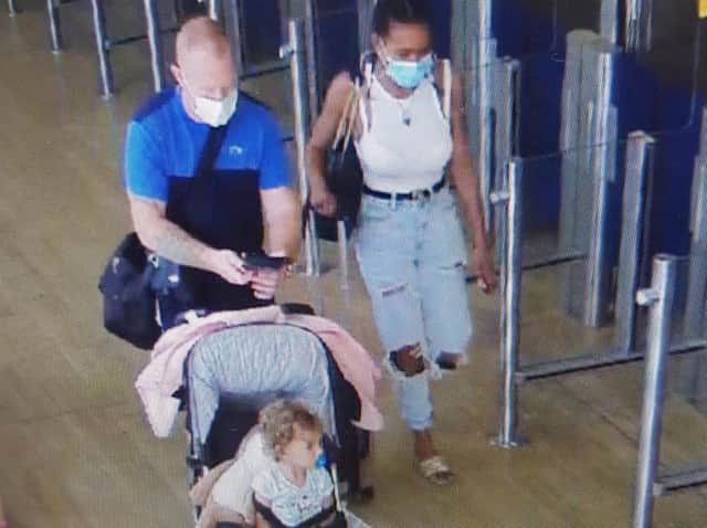 Lee Rogers and Kelly Gibson captured on CCTV at Alicante Airport with toddler Grace-May Rogers.