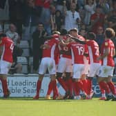 Morecambe celebrate the only goal in their win against Sheffield Wednesday