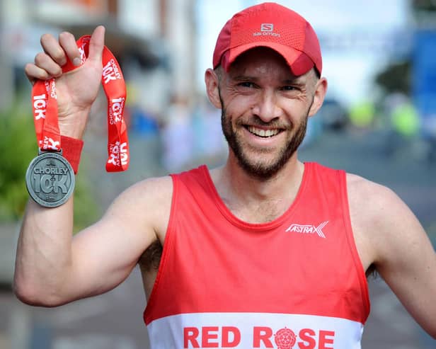 First place runner Simon Croft, 40, of Red Rose Road Runners, with his medal after completing Chorley 10K yesterday (Sunday, August 29). Pic: Chorley Council