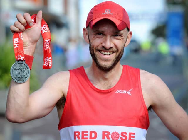 First place runner Simon Croft, 40, of Red Rose Road Runners, with his medal after completing Chorley 10K yesterday (Sunday, August 29). Pic: Chorley Council
