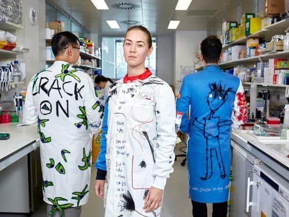 The lab coats decorated by textile artist Rosalind Wyatt for the Institute of Cancer Research