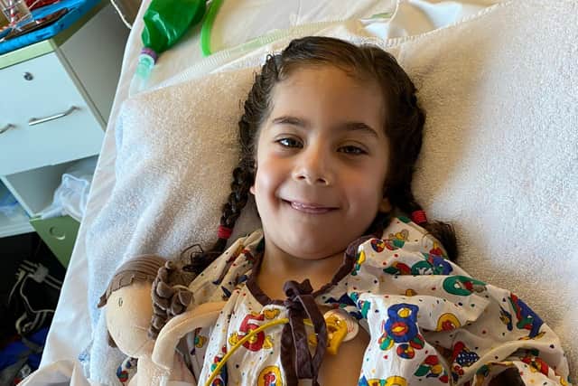 Riziah lives with a pacemaker in her stomach to keep her heart beating