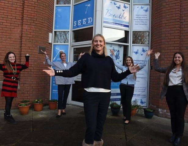 Founder and Clinical Director of Breathe Therapies, Shelley Perry, with some of the team