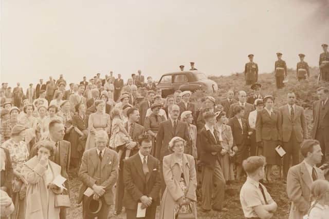 A large crowd gathers to pay their respects after a Wellington Bomber on a training flight went down on Anglezarke Moor in November 1943. Picture courtesy  of Stuart Clewlow.