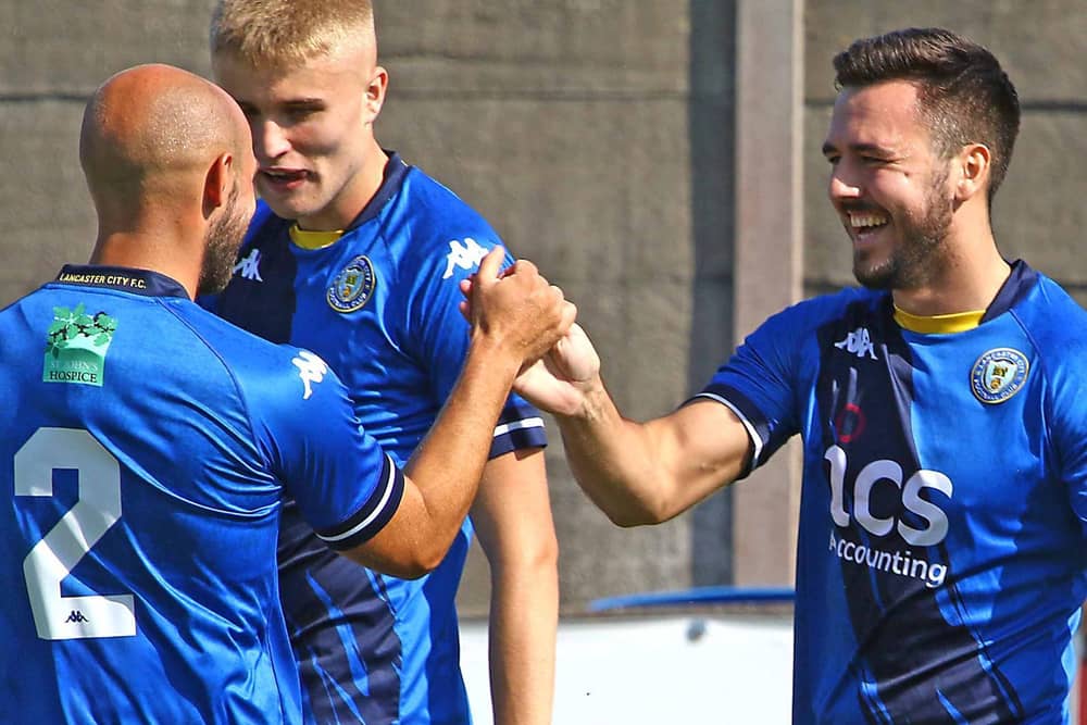 Rhys Turner, right, is congratulated after scoring against Mickleover last weekend (photo: Tony North)
