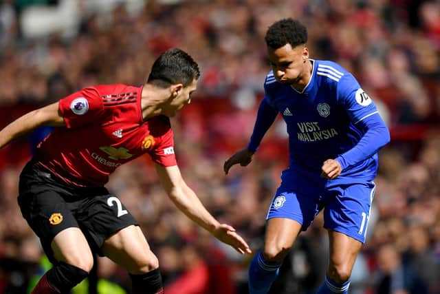 PNE loanee Josh Murphy takes on Manchester United's Diogo Dalot