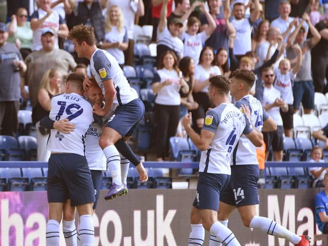 Preston North End players celebrate Sepp van den Berg's goal against Swansea at Deepdale
