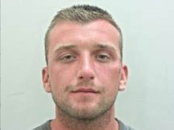 Jake Campbell, 27, of Marsett Place, Preston, is wanted for failing to appear at court in connection with alleged stalking offences. He has links to East Lancashire, Preston and Wigan. Pic: Lancashire Police