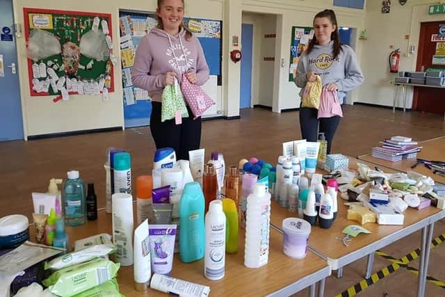 Rangers pack up comfort bags which were donated to a women's refuge