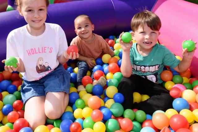 Fun in the ball pond with (l-r) Lola Dring, aged nine, one-year-old Mylo Banks and Joshua Dring, five.