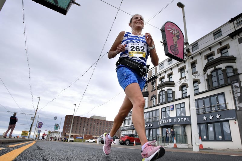 Runners take part in the Blackpool Half and full marathon along the promenade in Blackpool on Sunday.